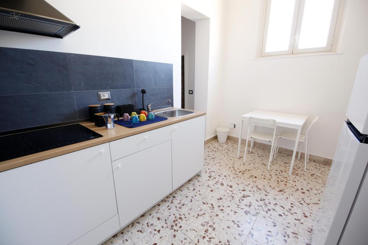 Center Apartment Catania Bagian luar foto